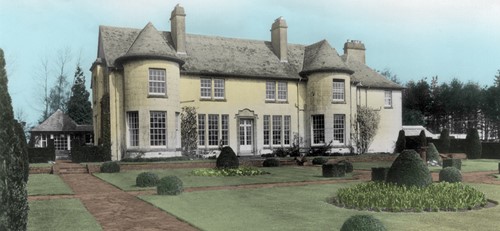 Vintage photo of Rufflets St Andrews with manicured gardens and early 20th-century architecture.